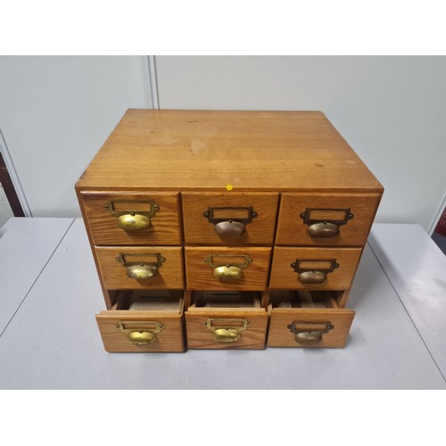 23 - Solid wood 9 drawer index card cabinet.
50cm l x 42cm d x 35cm h