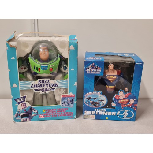 29 - Boxed Buzz Lightyear along with boxed Justice League Flying Superman.