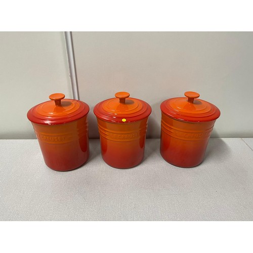 35 - 3 x Le Creuset storage jars in volcanic orange/red.