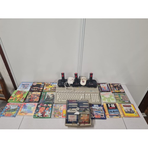 37 - Atari ST Compute, 3 joy sticks and 2 computer mice and large collection of games to include Batman a... 