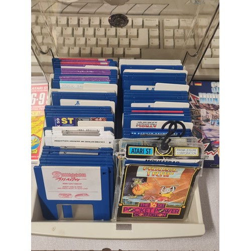 37 - Atari ST Compute, 3 joy sticks and 2 computer mice and large collection of games to include Batman a... 