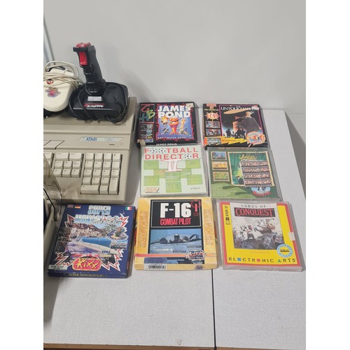 37 - Atari ST Compute, 3 joy sticks and 2 computer mice and large collection of games to include Batman a... 