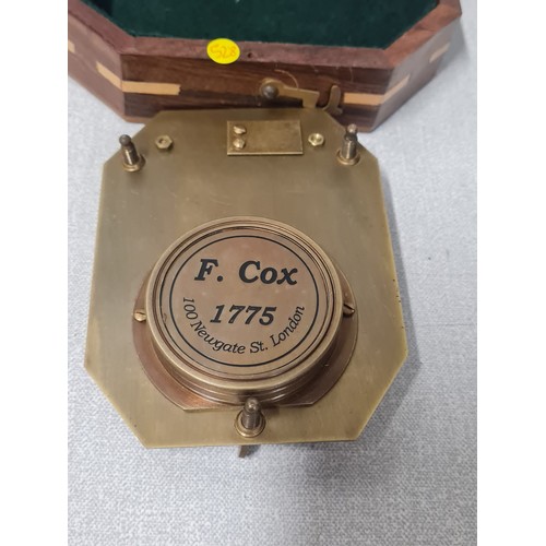 51 - Antique style F.Cox brass sundial compass in wooden case.