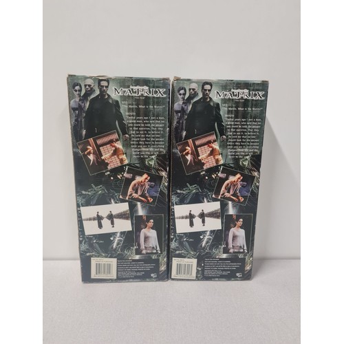 63 - 2 x boxed Matrix figures - Neo and Trinity. 2000