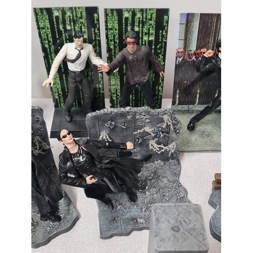 64 - Large collection of Matrix action figures.