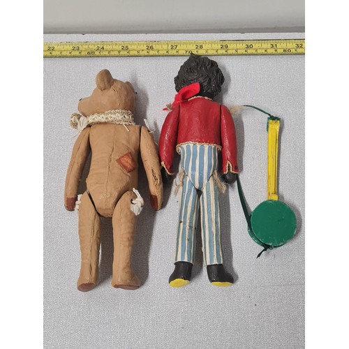 75 - 2 x ceramic figures - patched teddy bear and Golly doll both with moveable limbs.
tallest 23cm