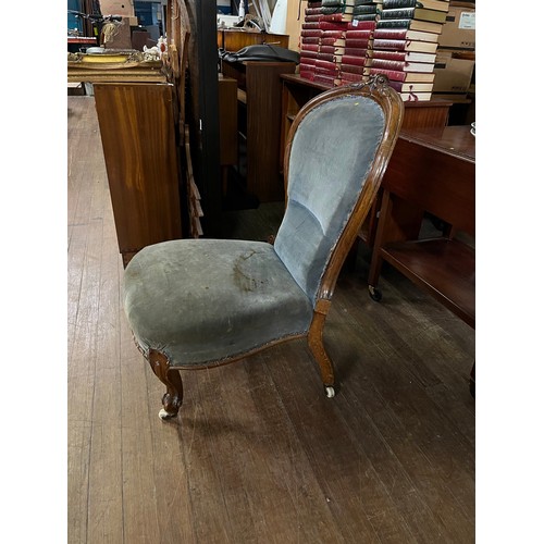 188 - Victorian spoon back chair on casters.