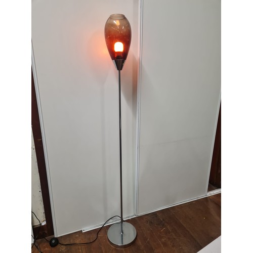 239 - Next floor lamp with red glass shade.