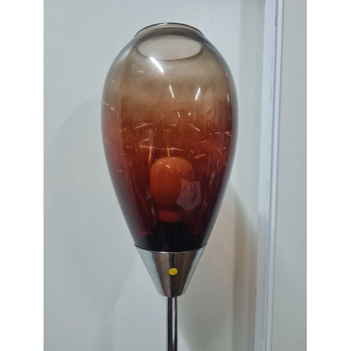 239 - Next floor lamp with red glass shade.