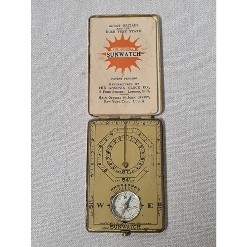 246 - Antique 1920's Ansonia Sunwatch compass in brass case with booklet.