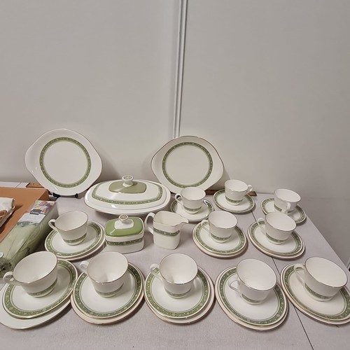 462 - 35 piece Royal Doulton Rondelay tea set along with vintage table covers.