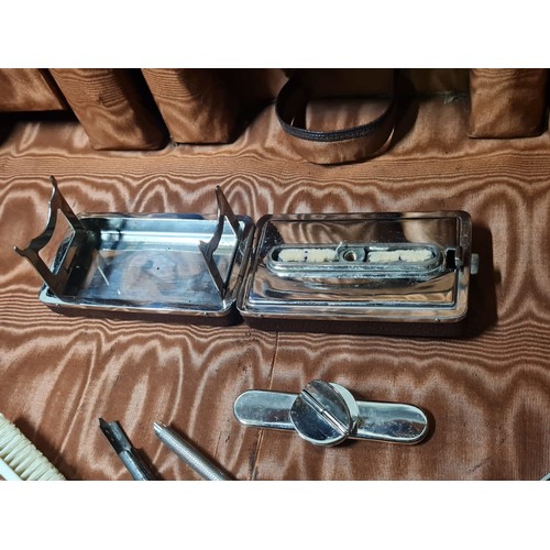 71 - Vintage ladies traveling vanity suitcase with spirit burner for tongs, some of the original accessor... 