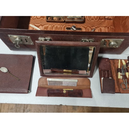 71 - Vintage ladies traveling vanity suitcase with spirit burner for tongs, some of the original accessor... 