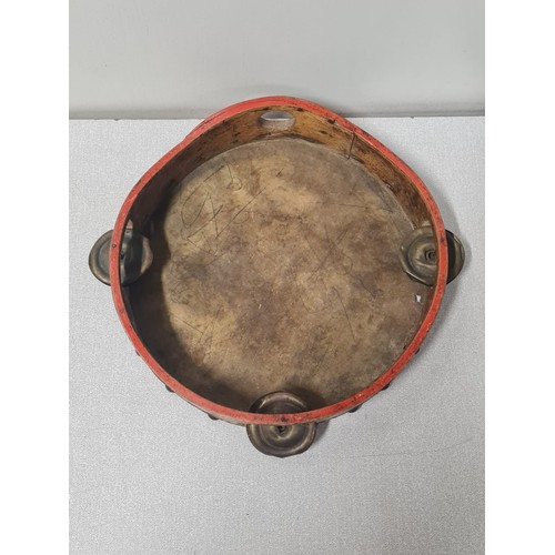 258 - Antique wood and pigskin tambourine.