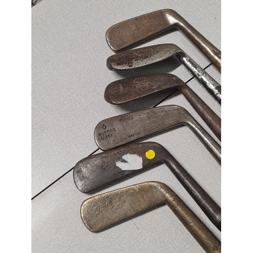 308 - 6 hickory shafted golf clubs.