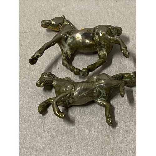 320 - pair of heavy metal horses