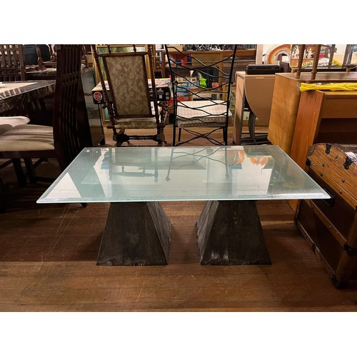 414 - Modern glass top garden table.