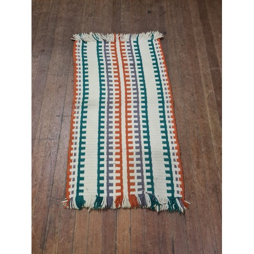 427 - Small woven floor rug.