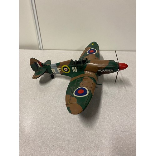 301 - Tinplate spitfire plane.
41cm l