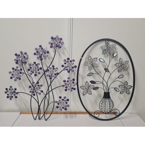 406 - 2 decorative metal wall hangings.