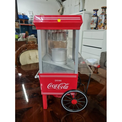 204 - Nostalgia Electrics Coca-Cola Popcorn machine.
42cm h