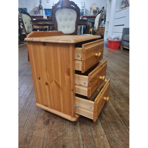 455 - Pine 3 drawer bedside cabinet.