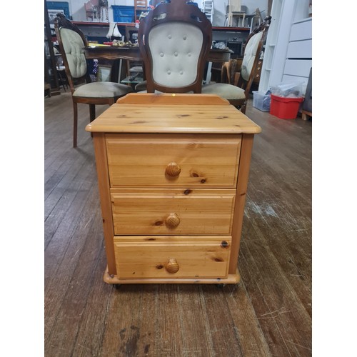 455 - Pine 3 drawer bedside cabinet.