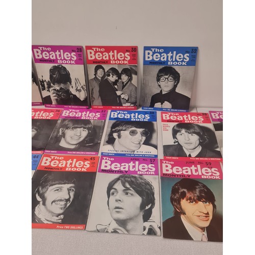 57 - Collection of 21 The Beatles Monthly Bok magazines.