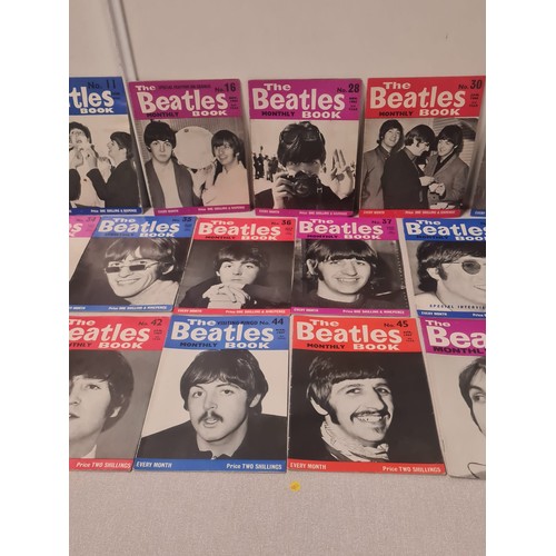 57 - Collection of 21 The Beatles Monthly Bok magazines.