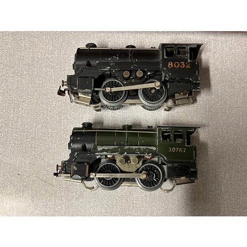 33 - Trix Twin Railway carriages and two engines in original box.