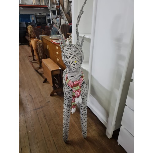 123 - Large rattan reindeer Christmas decoration.
124cm h