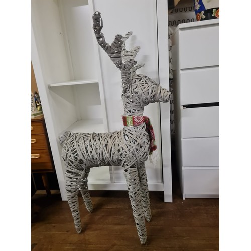 124 - Large rattan reindeer Christmas decoration.
124cm h