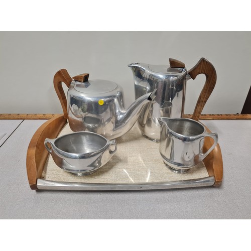 232 - Piquot ware tea set and tray.