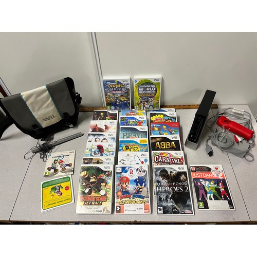 327 - Wii console with 21 games etc. - (no controllers)