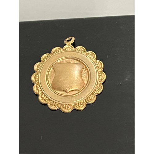 243 - 9ct gold hallmarked pendant 
4.3 grams