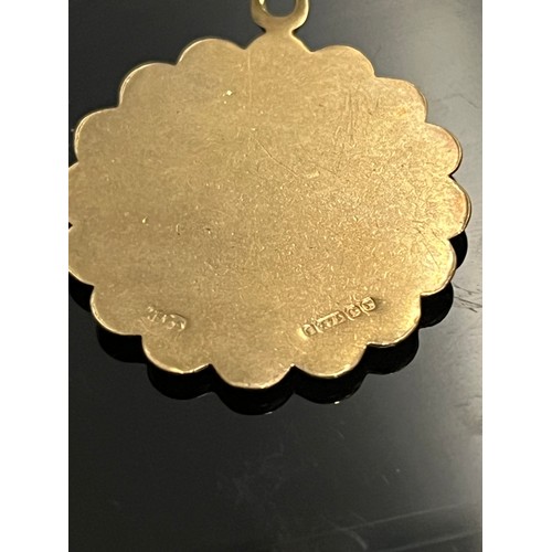 243 - 9ct gold hallmarked pendant 
4.3 grams