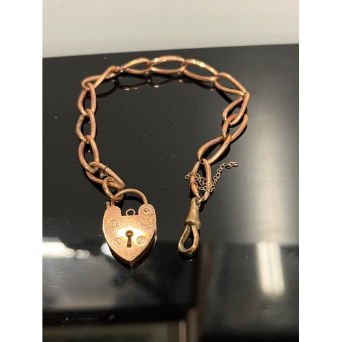 244 - 9ct rose gold hallmarked bracelet with heart lock
16 grams