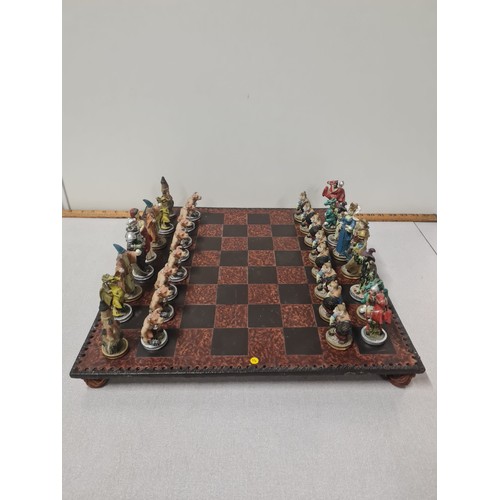 67 - Chess set (fantasy pieces) and board.