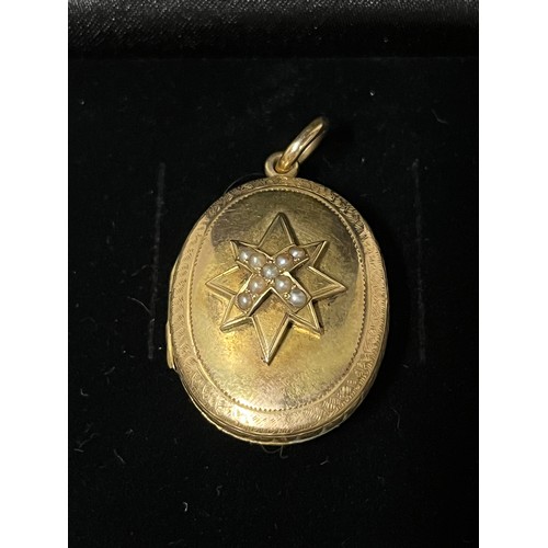 276 - unmarked victorian gold & pearl mouring locket with hair
testing over 9ct 
8.8 grams