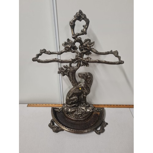 347 - ornate cast iron umbrella stick stand in the form of a dog under a tree. 70cm tall