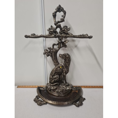 347 - ornate cast iron umbrella stick stand in the form of a dog under a tree. 70cm tall