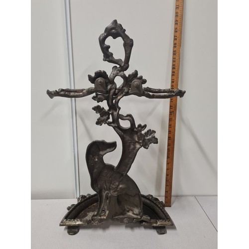 347 - ornate cast iron umbrella stick stand in the form of a dog under a tree. 70cm tall