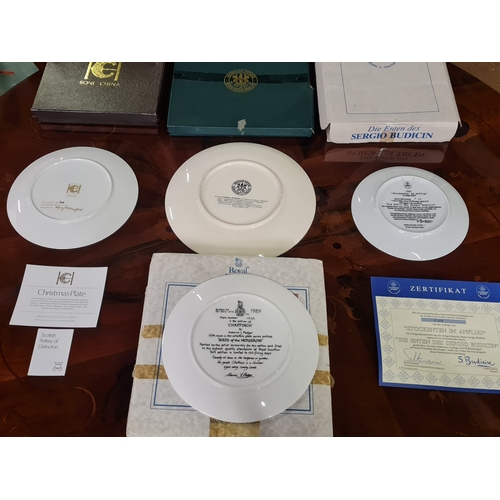 458 - 4 Boxed decorative plates, to include Royal Doulton & Highland Fine Bone China etc.