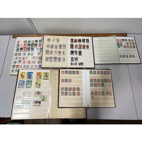 520 - 5 albums to include stamps of the world.