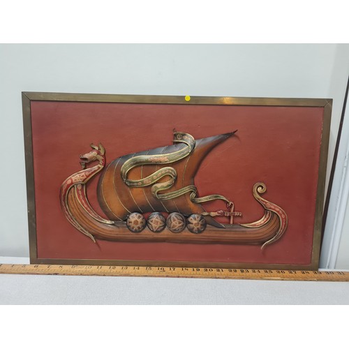 485 - Framed leather Viking ship picture.