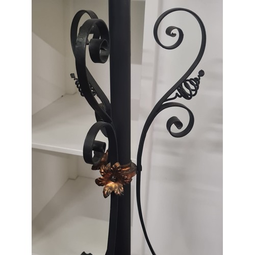 13 - Wrought iron rise and fall decorative plant stand.