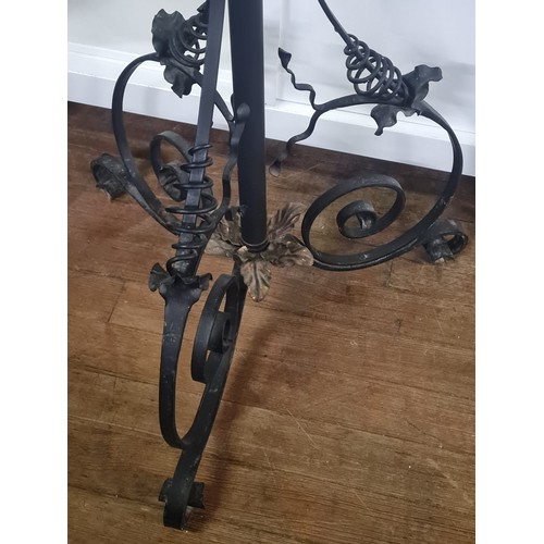 13 - Wrought iron rise and fall decorative plant stand.