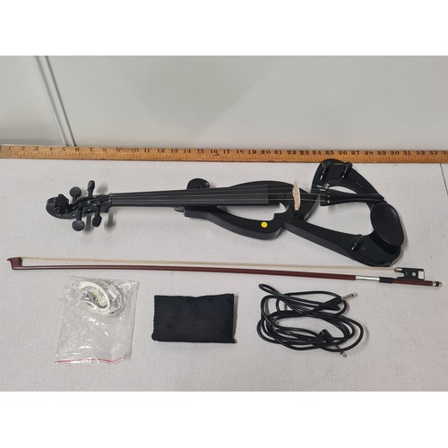 19 - Electric violin set, comes with bow, bag and earphones.