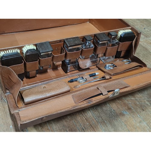 72 - Vintage gentleman's travel vanity suitcase with accessories to include brushes and aftershave bottle... 