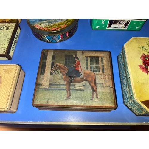 107 - Collection of vintage tins to include Fox's and Tam O' Shanter tobacco etc.